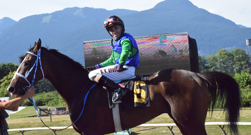 Lord Vancouver & jockey Denis Araujo at the winner's circle on BC Cup day.